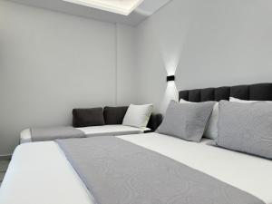 Voodi või voodid majutusasutuse Ionian View B&B toas