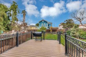 a boardwalk leading to a house with a grill on it at Stay In A Piece of San Jose History. in San Jose