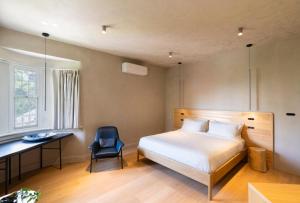 In The Brick Spa And Hotel客房内的一张或多张床位