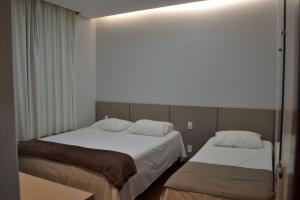 Ένα ή περισσότερα κρεβάτια σε δωμάτιο στο OP'S HOTEL