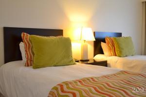 Postel nebo postele na pokoji v ubytování Hotel Quinto Elemento + 26 fotografií