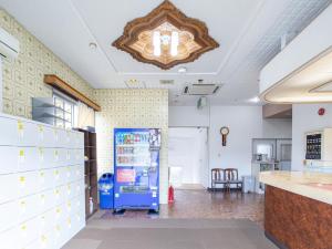 a room with a vending machine in a store at HOTEL Tsuru Sendai in Satsumasendai