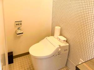 Koupelna v ubytování Rakuten STAY VILLA Miyakojima Maehama Beach + 30 fotografií