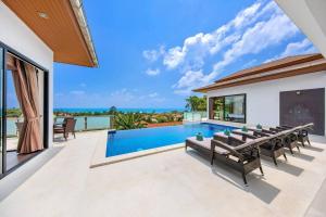 Πισίνα στο ή κοντά στο Sunny Banks 4 Bedroom Pool Villa
