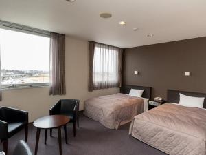 Postel nebo postele na pokoji v ubytování Hotel Epoka Tabist