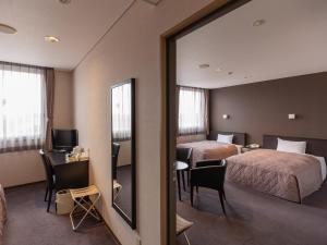 Postel nebo postele na pokoji v ubytování Hotel Epoka Tabist