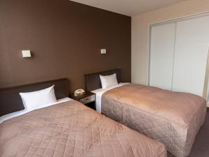 Postel nebo postele na pokoji v ubytování Hotel Epoka Tabist