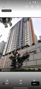 a picture of a large apartment building at Studio near Ayala Vertis North in Manila