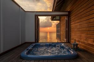 Fotografie z fotogalerie ubytování Veligandu Maldives Resort Island v Rasdu + 37 fotografií