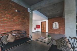 Posezení v ubytování ARENA BY SERENDIA Aparthotel