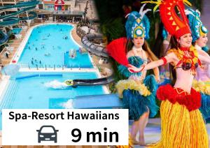 two women are standing in front of a swimming pool at Guesthouse & Kitchen Hace in Iwaki