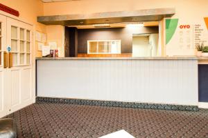 a bar in a restaurant with a counter top at Commercial Hotel in South Bank