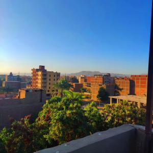 a view of a city skyline with buildings at Amazing Mountain View-Near City Center in Luxor