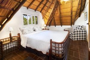 a bedroom with a bed in a room at Casa en Punta del Este in Punta del Este