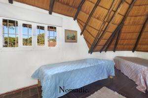 Säng eller sängar i ett rum på Casa en Punta del Este