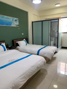 Letto o letti in una camera di 塔斯汀精品民宿