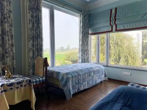 Postel nebo postele na pokoji v ubytování Brigadier Farm Stay Sunset Room