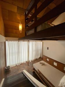מיטה או מיטות בחדר ב-Boracay Coco Huts