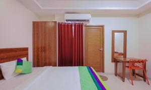 Postel nebo postele na pokoji v ubytování Itsy Hotels Elite Inn