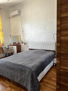 Postel nebo postele na pokoji v ubytování Guest House Maia