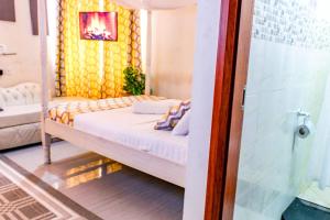 Voodi või voodid majutusasutuse SeaEsta suite 64 Nyali Mombasa toas