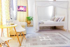 Voodi või voodid majutusasutuse SeaEsta suite 64 Nyali Mombasa toas
