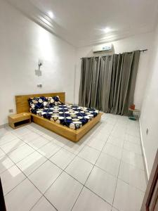Tempat tidur dalam kamar di Timba log-aupiais