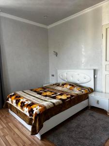 Postel nebo postele na pokoji v ubytování Guest House Maia