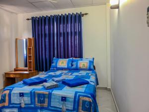 Postel nebo postele na pokoji v ubytování Shalom Villa