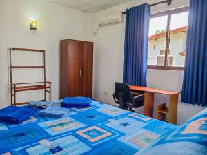 Postel nebo postele na pokoji v ubytování Shalom Villa