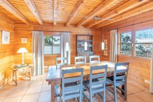 a dining room with a table and chairs at Allgäu Nest in Bad Hindelang