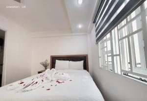Postel nebo postele na pokoji v ubytování Phuong Vy Hotel