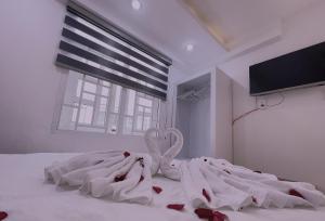 Postel nebo postele na pokoji v ubytování Phuong Vy Hotel