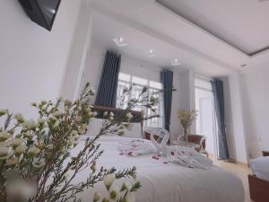 Postel nebo postele na pokoji v ubytování Phuong Vy Hotel