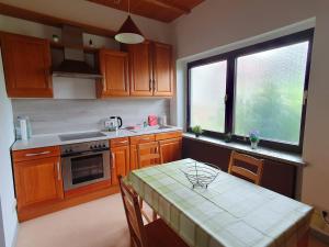 Η κουζίνα ή μικρή κουζίνα στο Ferienwohnung Stiege +16 φωτογραφίες