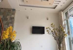 TV a/nebo společenská místnost v ubytování Phuong Vy Hotel
