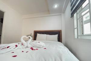 Postel nebo postele na pokoji v ubytování Phuong Vy Hotel