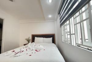 Postel nebo postele na pokoji v ubytování Phuong Vy Hotel