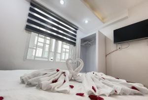 Postel nebo postele na pokoji v ubytování Phuong Vy Hotel