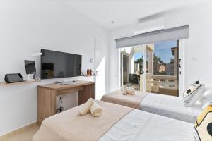 TV/trung tâm giải trí tại KASANDRA Luxury 2 Bedroom Townhouse