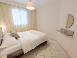 Posteľ alebo postele v izbe v ubytovaní Amelie Apartment