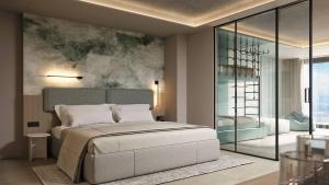1 dormitorio con 1 cama y una pintura en la pared en GRIFID Noa - Premium Ultra All Inclusive en Golden Sands