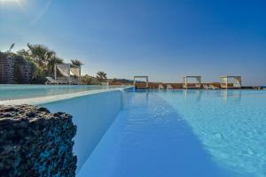 Bazén v ubytovaní Mursia Wellness Hotel alebo v jeho blízkosti