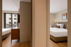 Tzl Suites Hotel Nişantaşı客房内的一张或多张床位