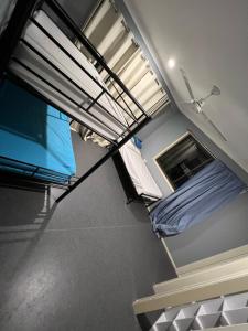 Postel nebo postele na pokoji v ubytování Tomato Backpackers