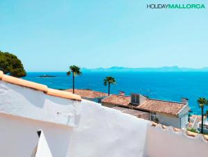 a view of the ocean from the roof of a building at Aucanada Love Nest in Alcudia +3 photos