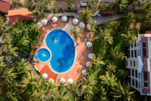 an overhead view of a swimming pool in a resort at Sea Lion Beach Resort Mui Ne in Mui Ne +81 photos