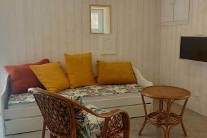 TV a/nebo společenská místnost v ubytování Une pause Champêtre : gîte avec terrasse