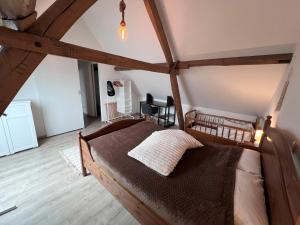 Postel nebo postele na pokoji v ubytování Gîte Rubis - JACUZZI - Pairi Daiza - 6 pers
