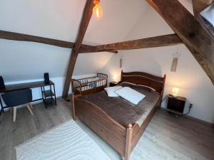 Postel nebo postele na pokoji v ubytování Gîte Rubis - JACUZZI - Pairi Daiza - 6 pers